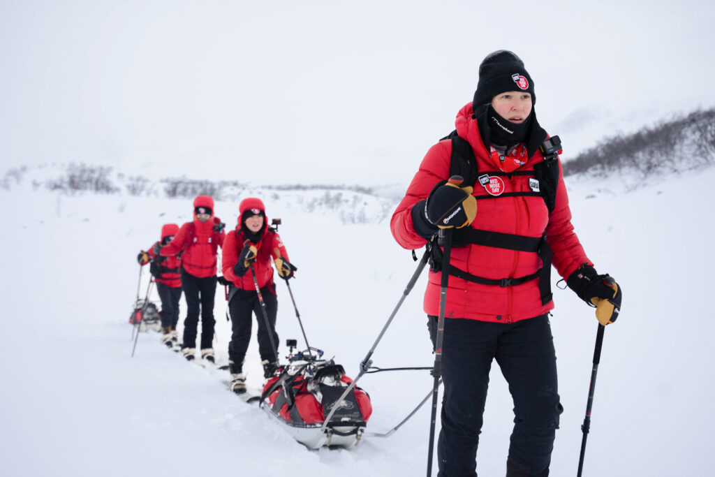 Day 3 - Pushing and pulling gear across the snow. (Photo by Brodie Hood/Comic Relief)